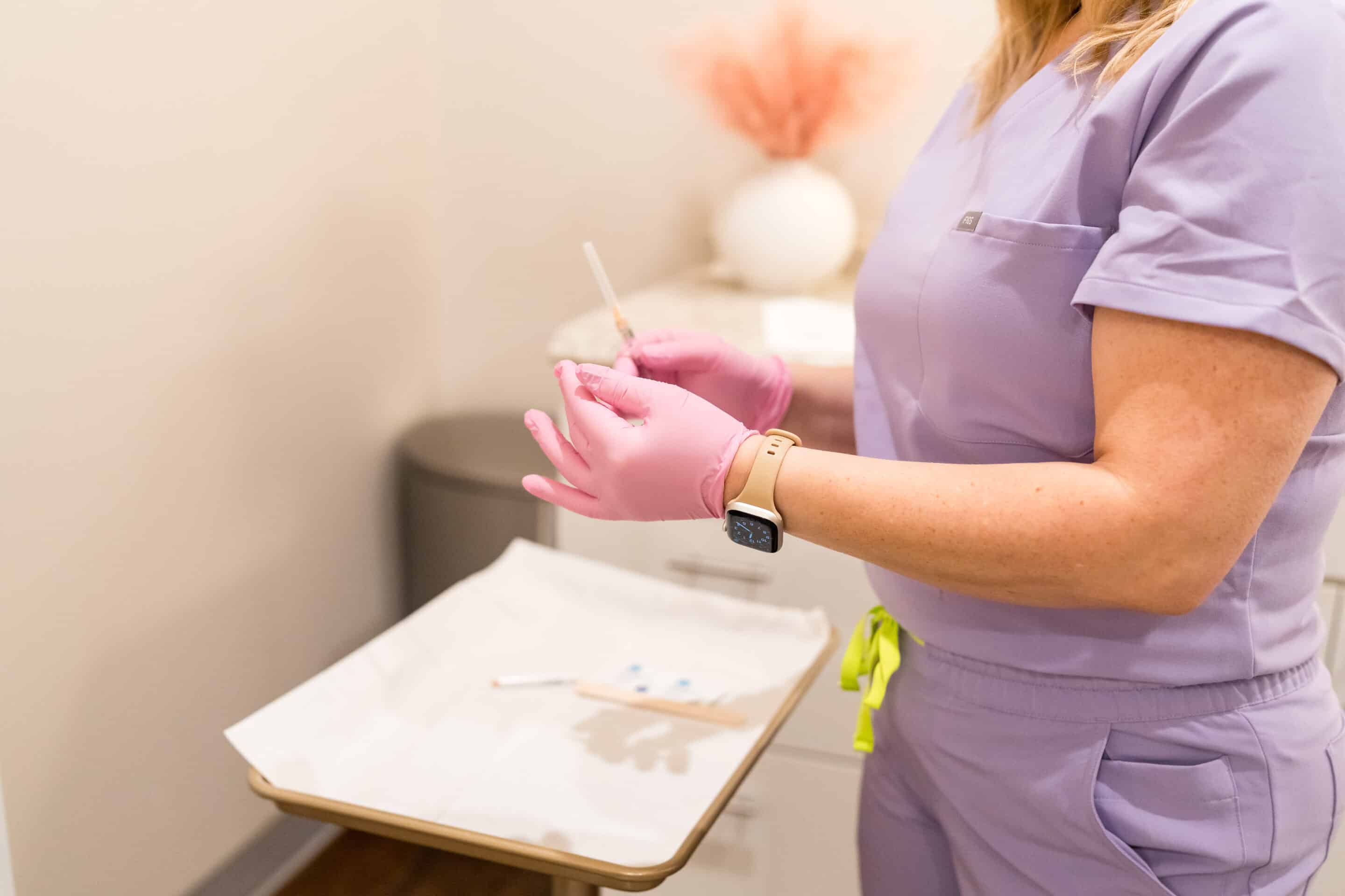 Britt injecting Dysport with precision at Banyan and Bamboo Austin med spa